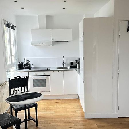 Appartamento Charmant Studio Au Coeur Du 18E Parigi Esterno foto