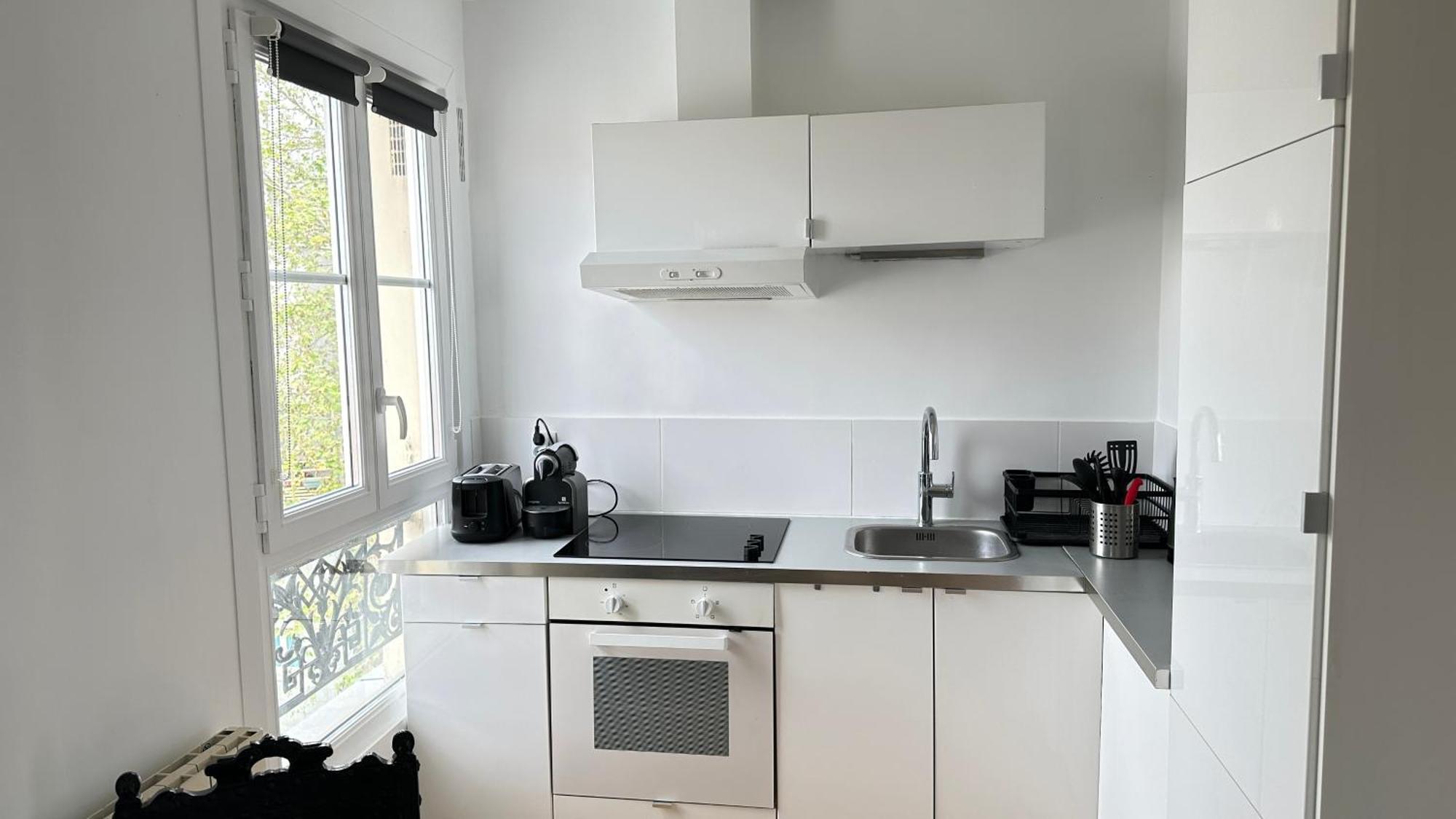 Appartamento Charmant Studio Au Coeur Du 18E Parigi Esterno foto